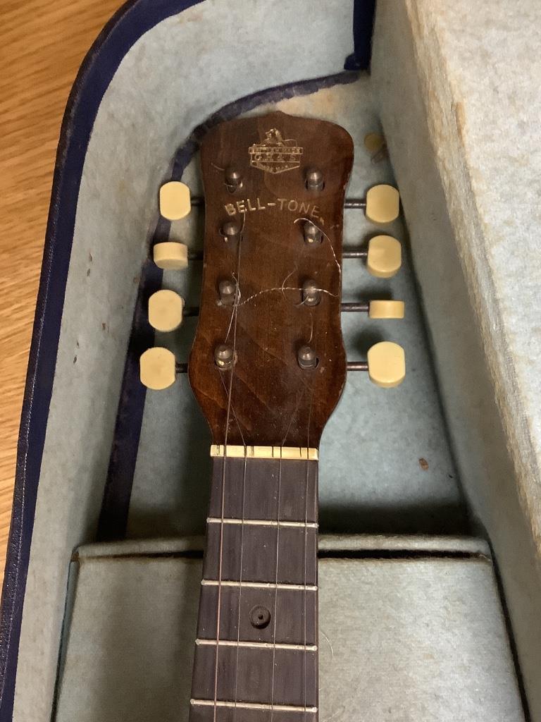 A ukelele, cased